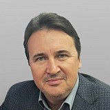 Олег Комаров